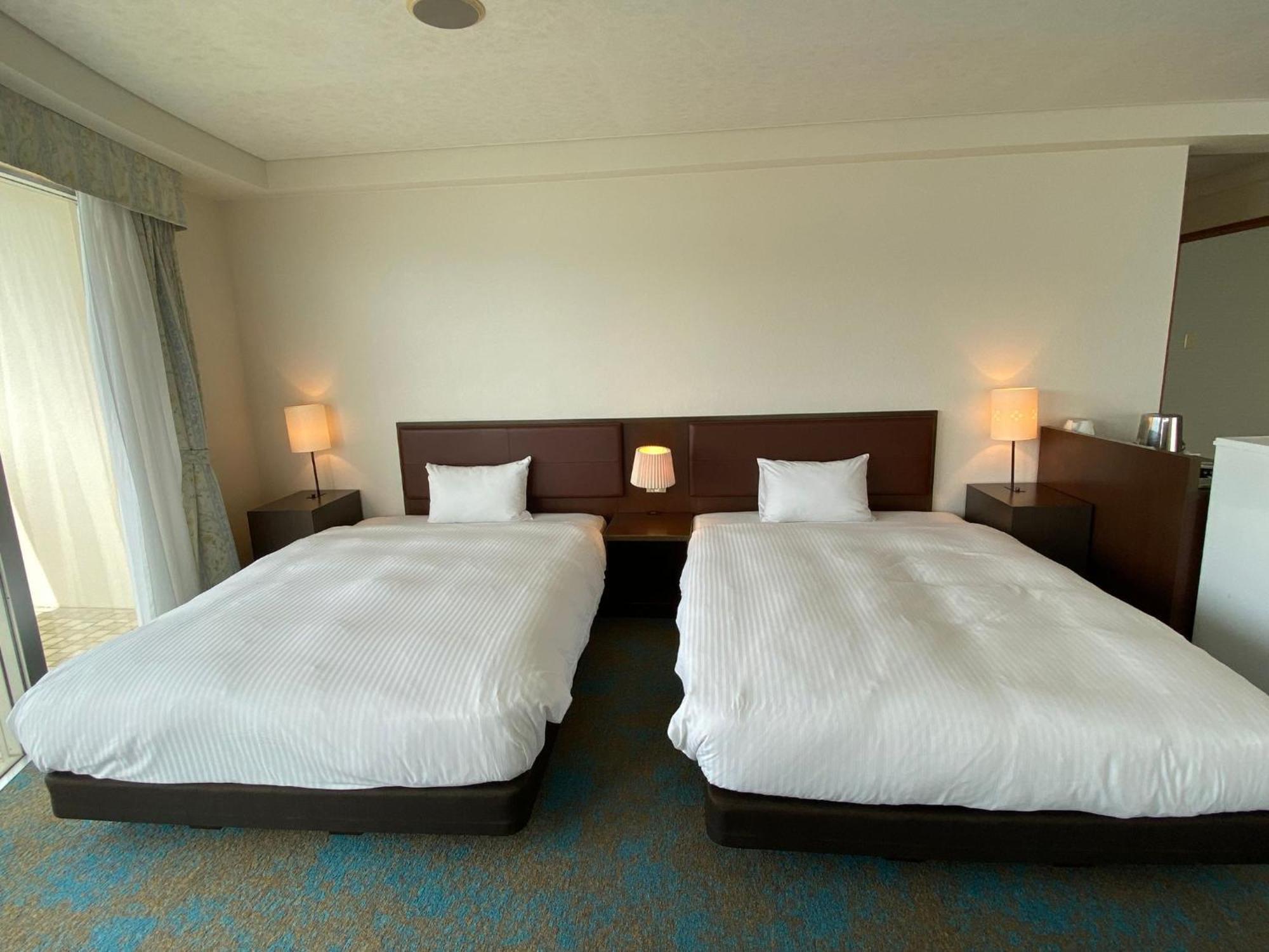 Hotel Resonex Nago Bagian luar foto